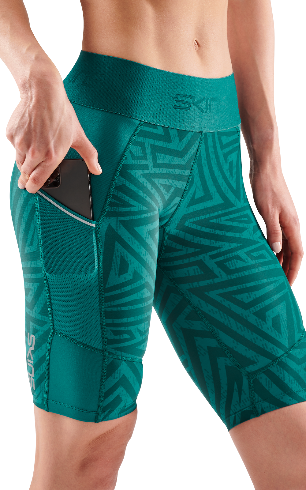 SKINS WOMEN'S COMPRESSION HALF TIGHTS 3-SERIES - LT. TEAL ANGLE